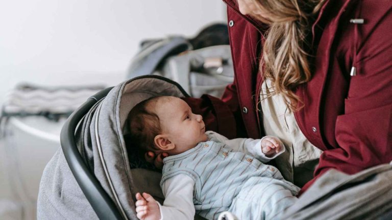 how to fold evenflo stroller